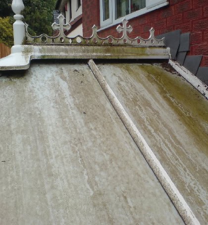 Dirty algae covered conservatory roof needing cleaning in Cheslyn Hay WS6