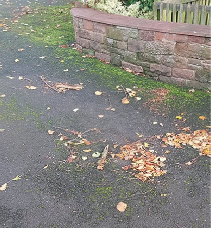 Dirty discoloured tarmac needing colour restoration in Bridgtown WS11