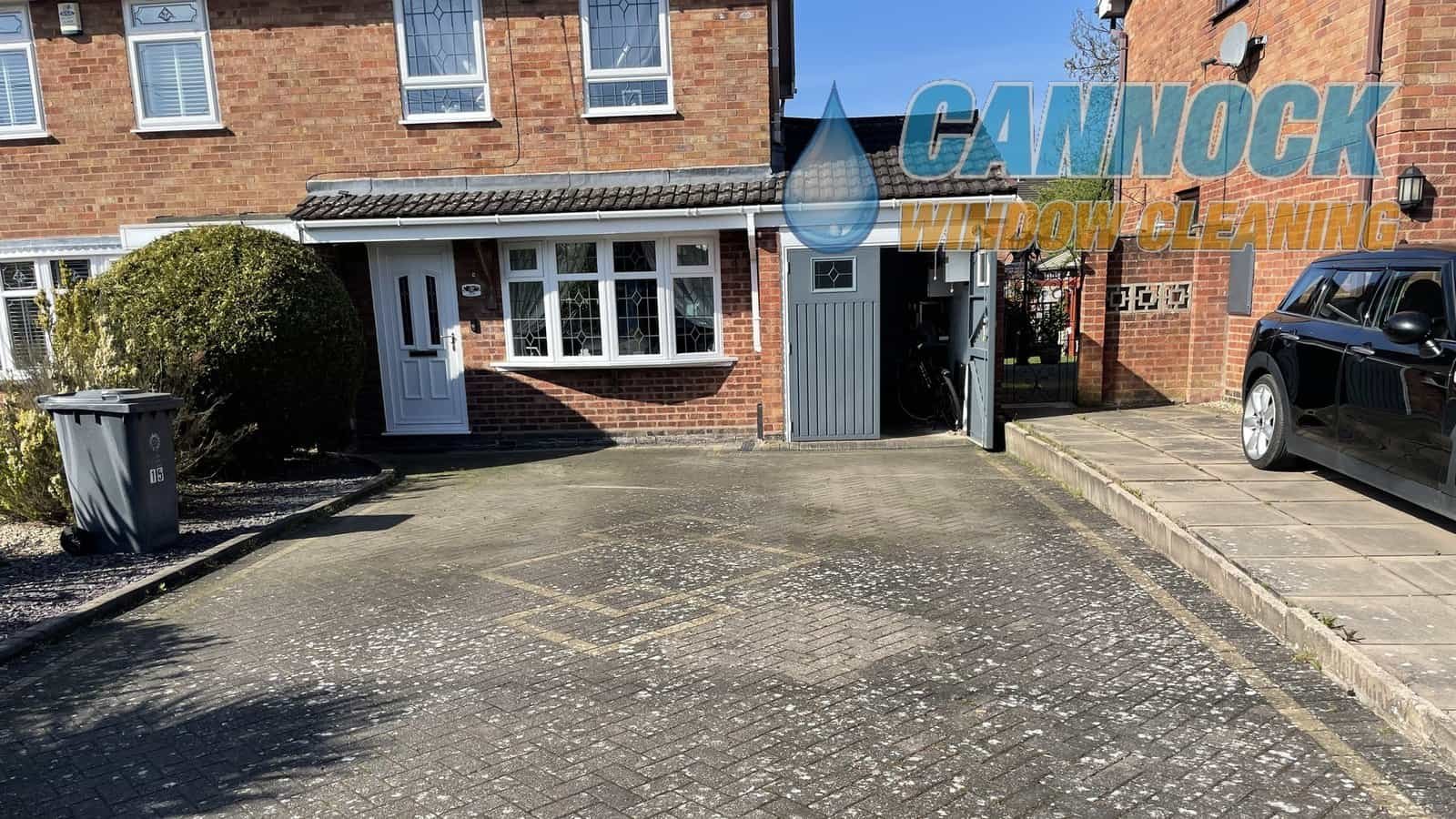 Dirty block paving driveway before cleaning