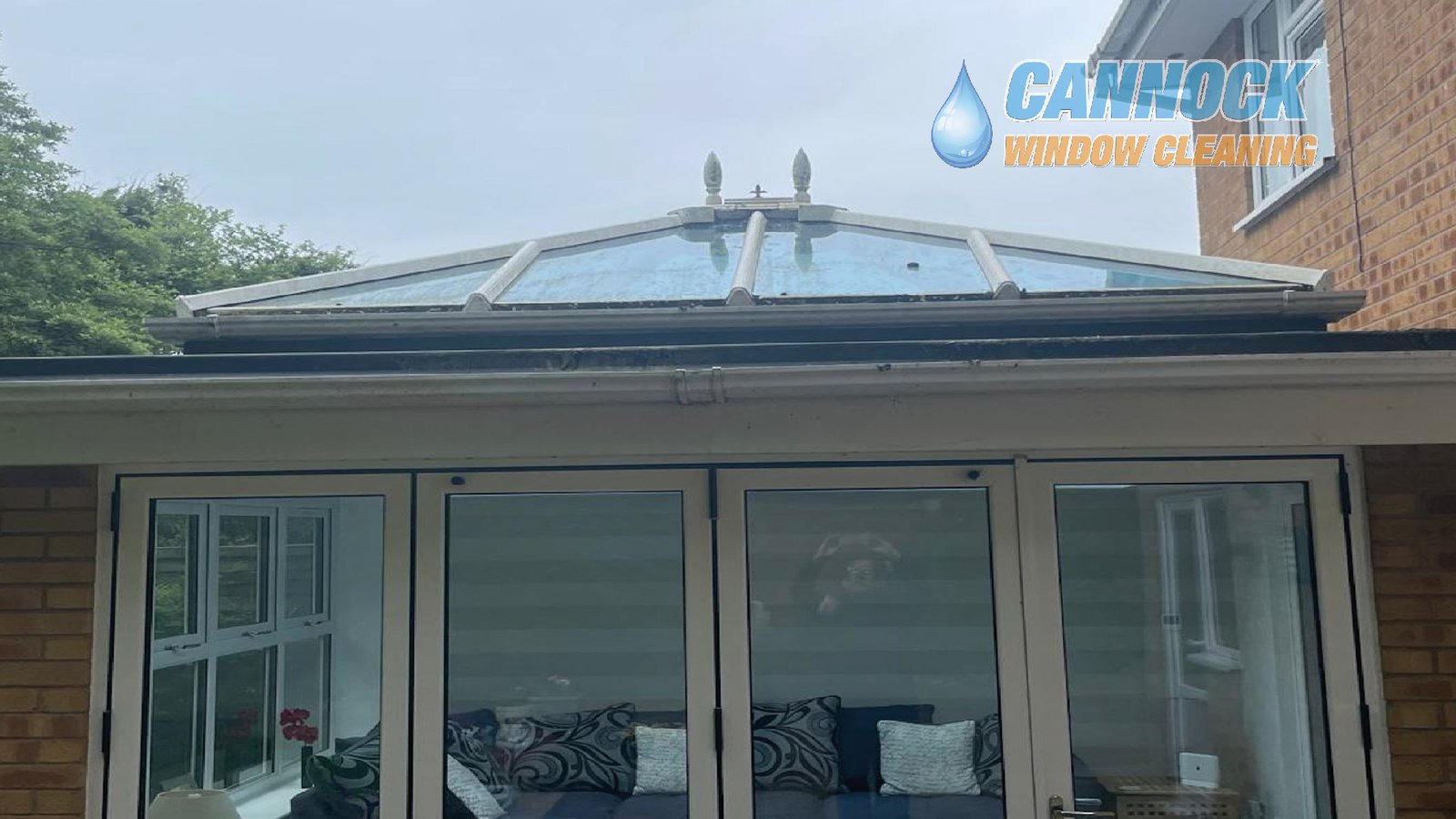 Orangery roof with dirty glass panels before cleaning Staffordshire