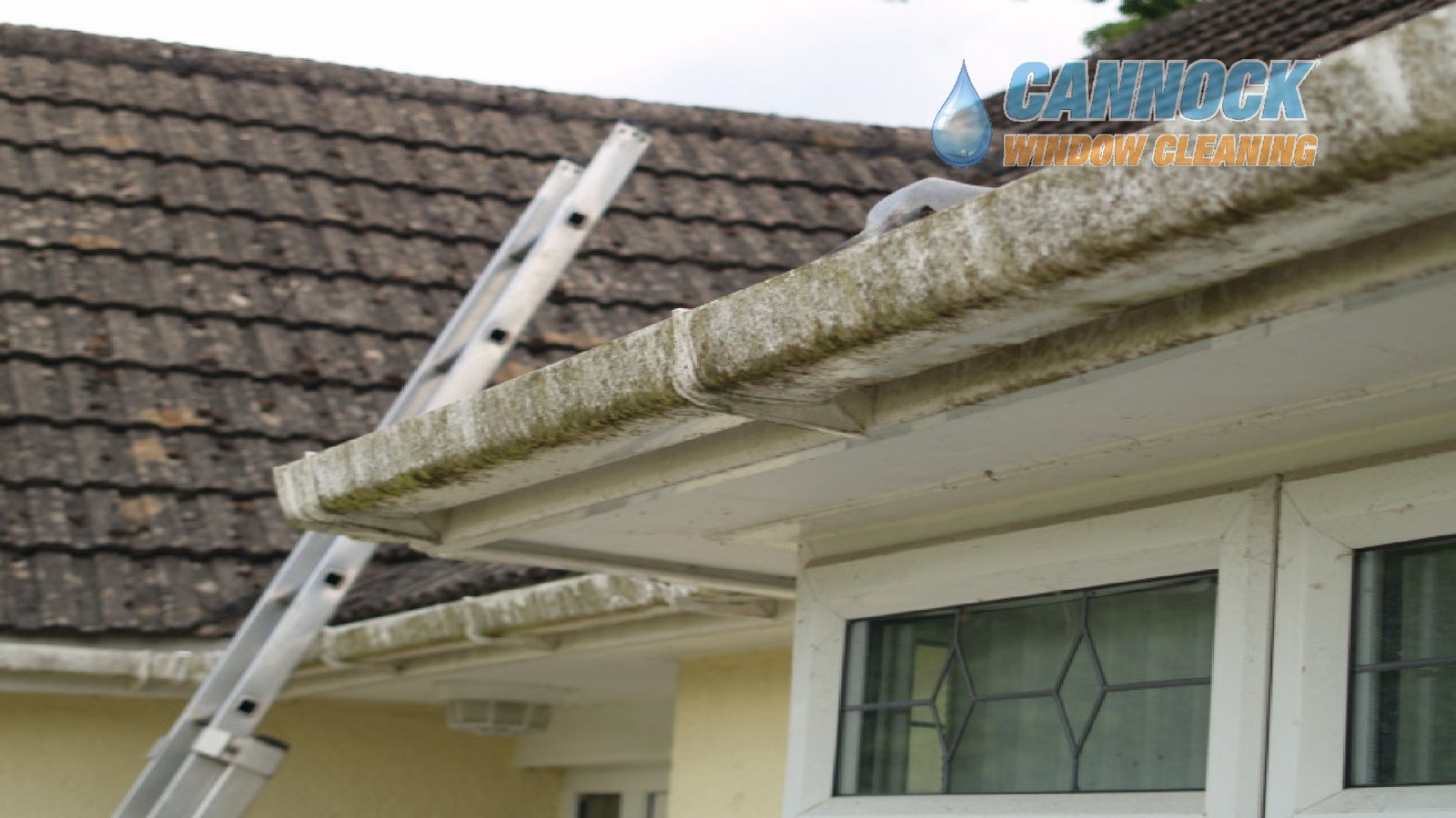Fascia and soffit cleaning in Cannock, before: boards dirty and streaked