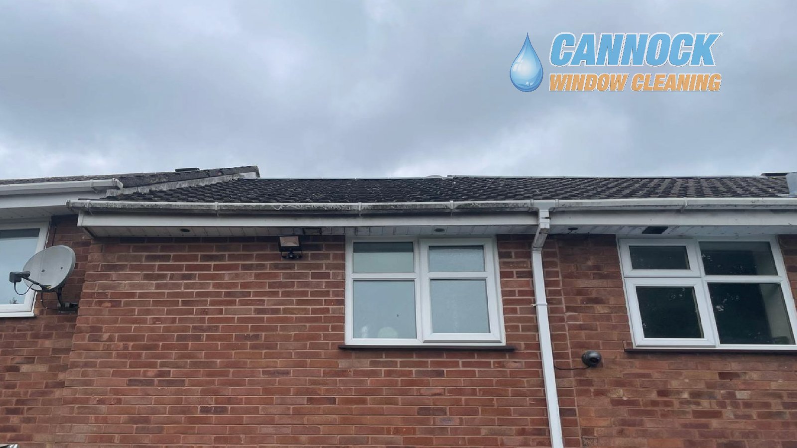 Weathered stained fascia boards before fascia and soffit cleaning