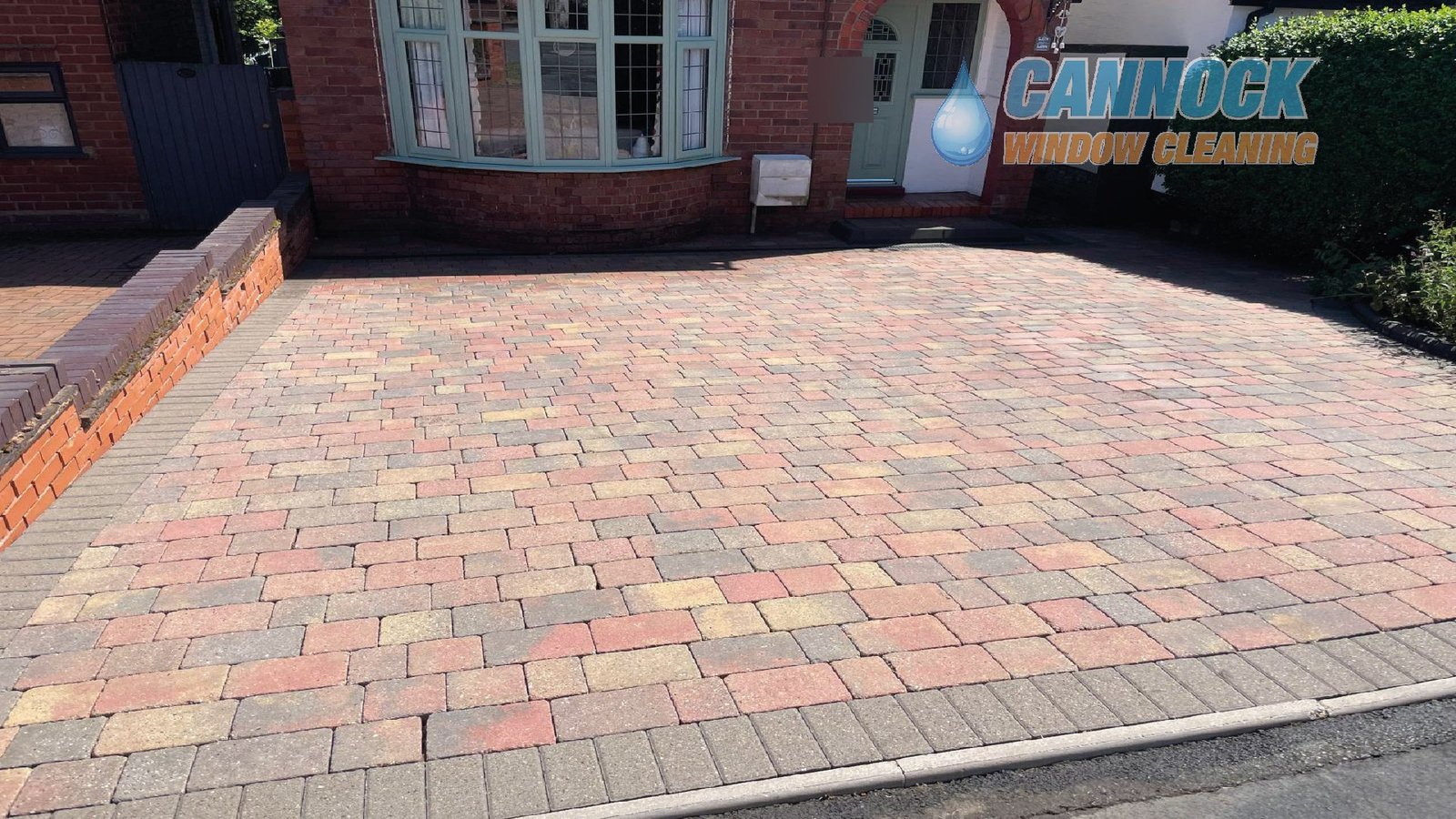 The same multi-coloured block paving drive with its colours back
