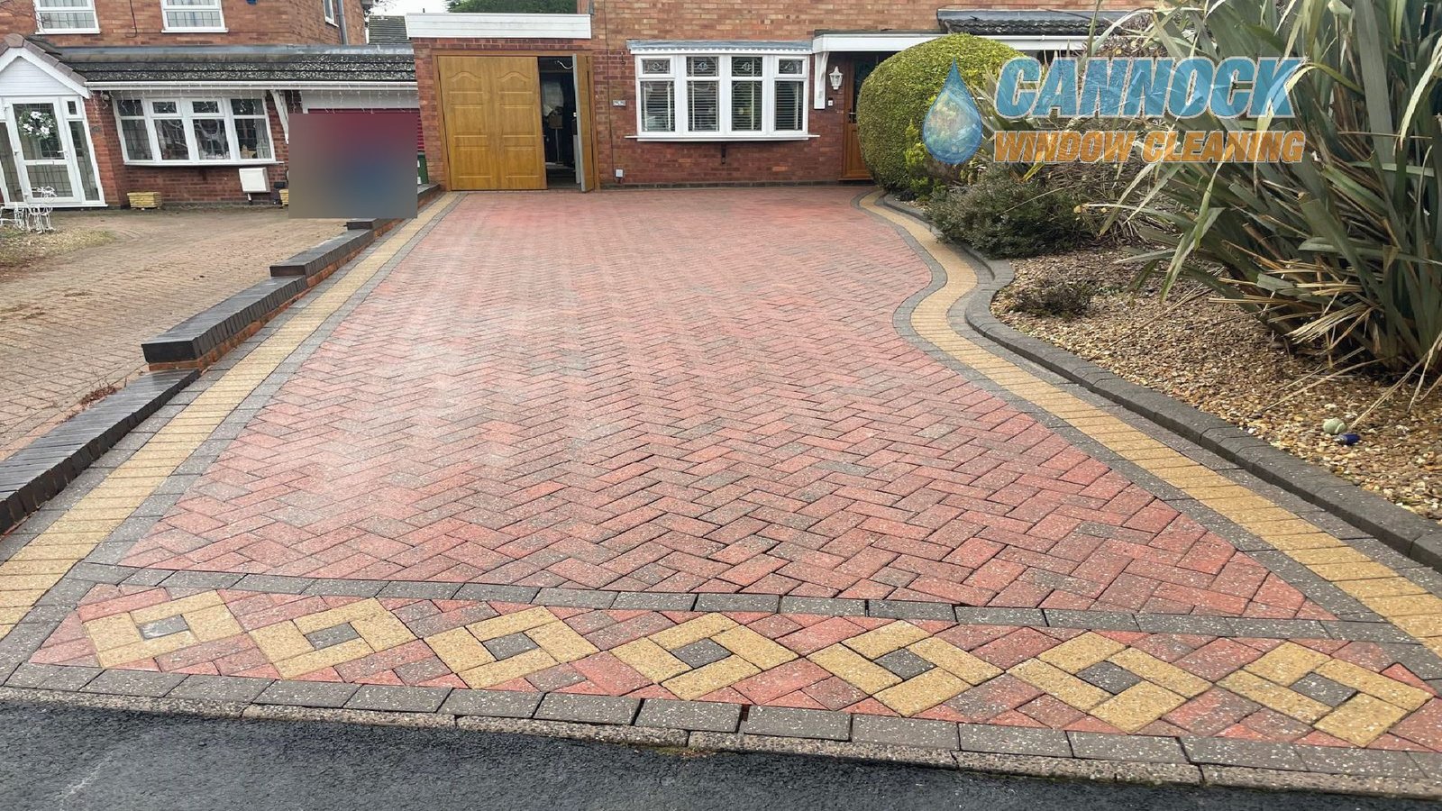 The same herringbone drive with its diamond border bright again