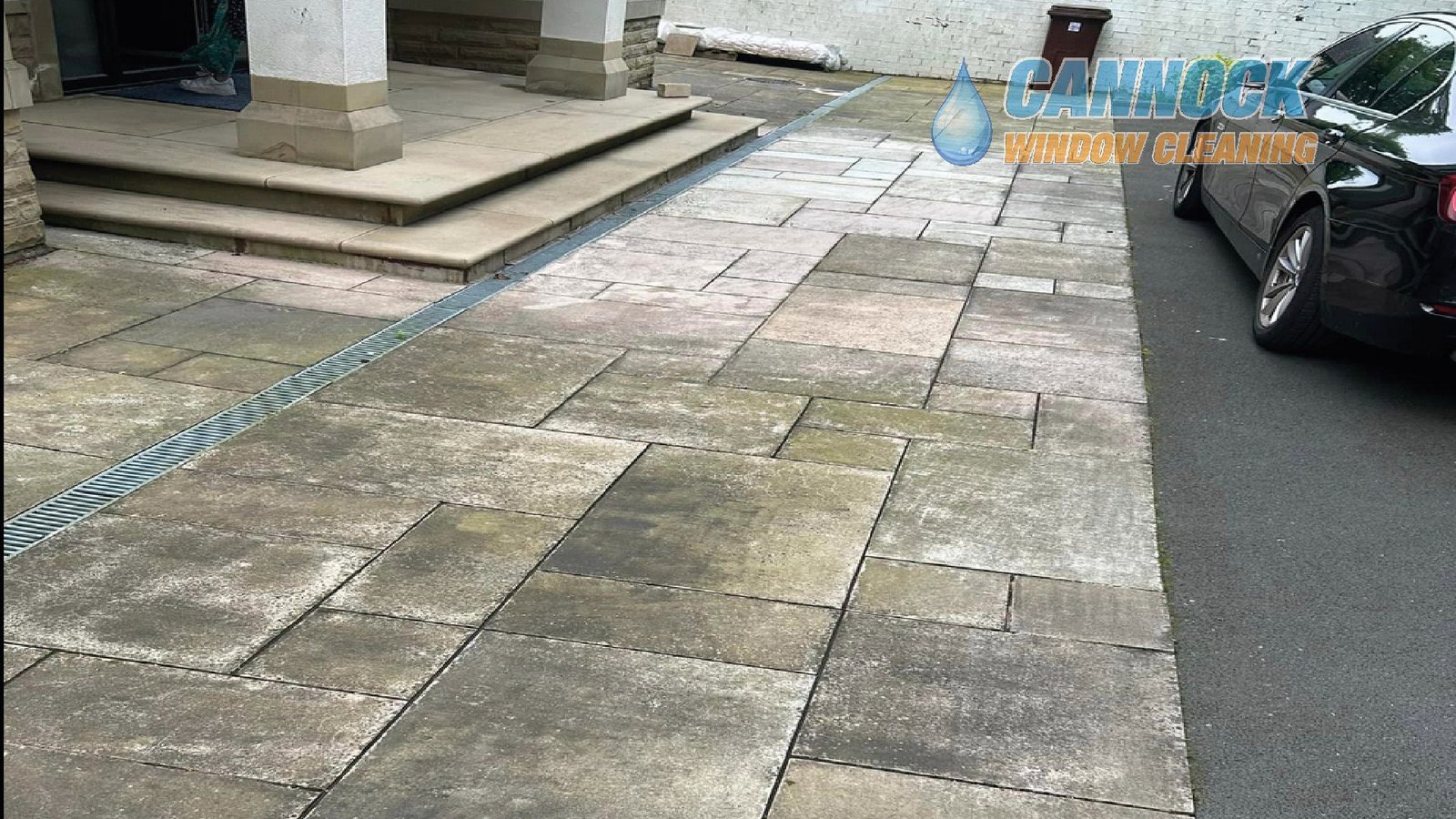 Sandstone slab drive dull and grey before cleaning