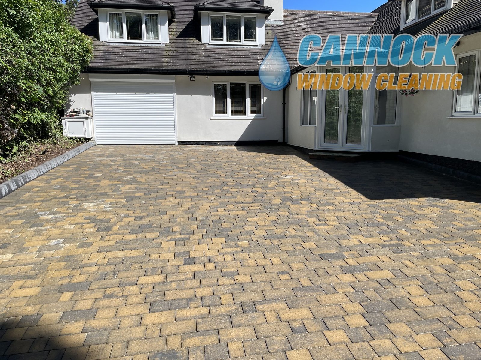 The same block paving drive with its golden colour back