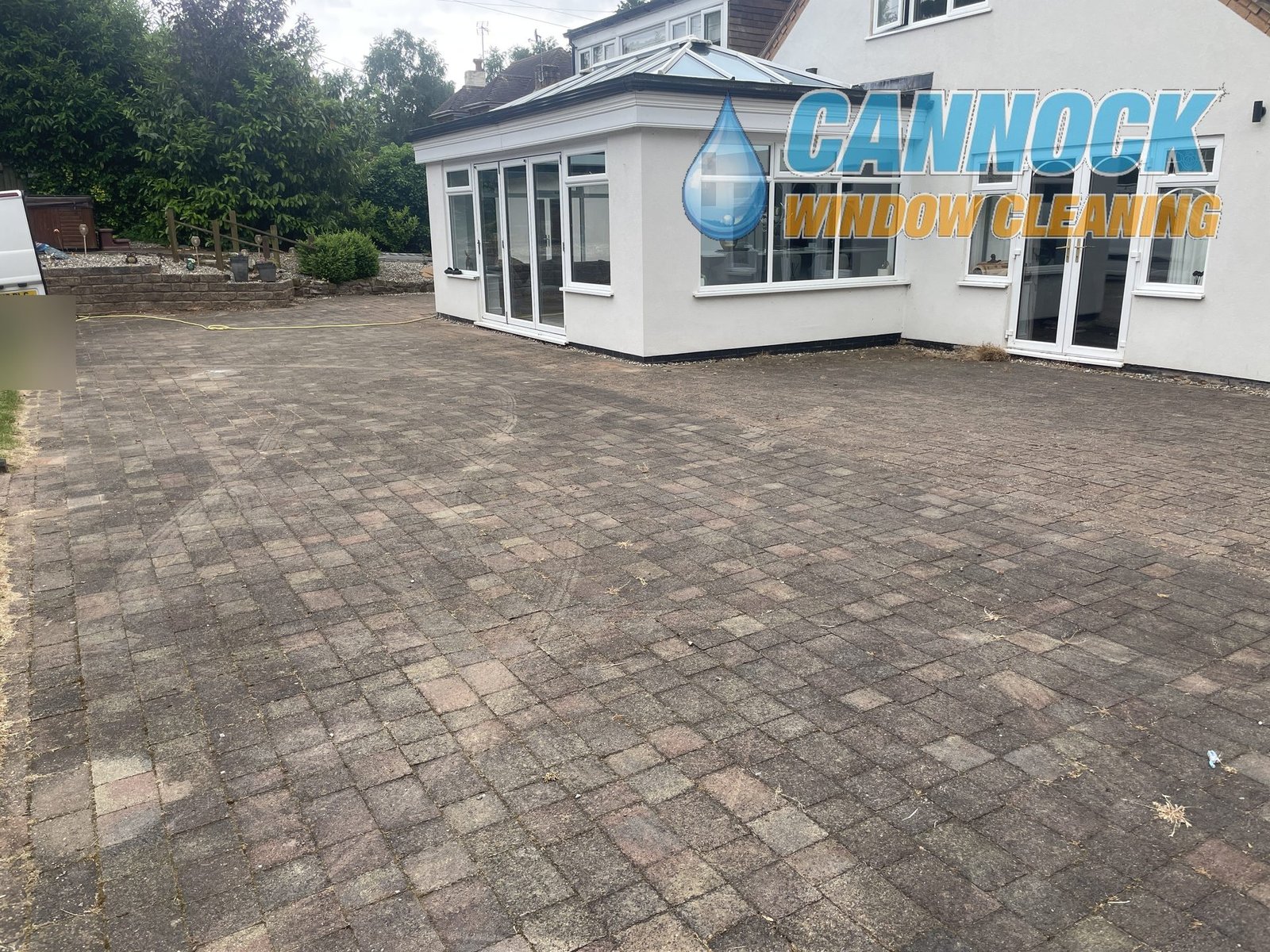 Large block paving drive faded before cleaning