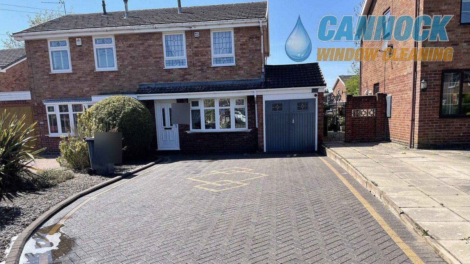 The same grey block paving drive clean