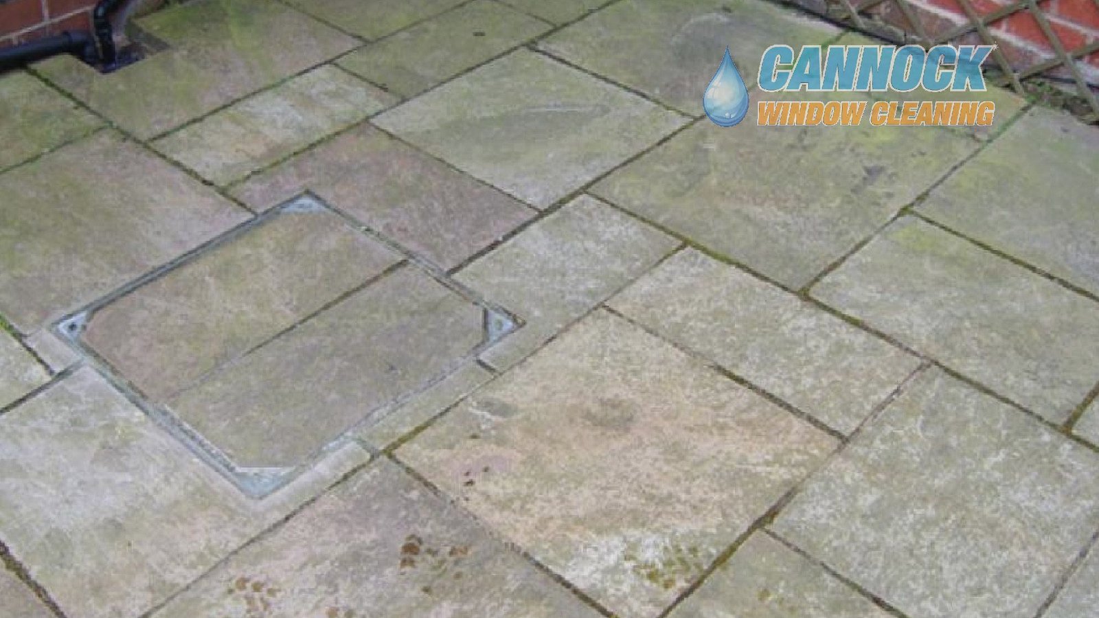 Sandstone patio grey with moss before cleaning