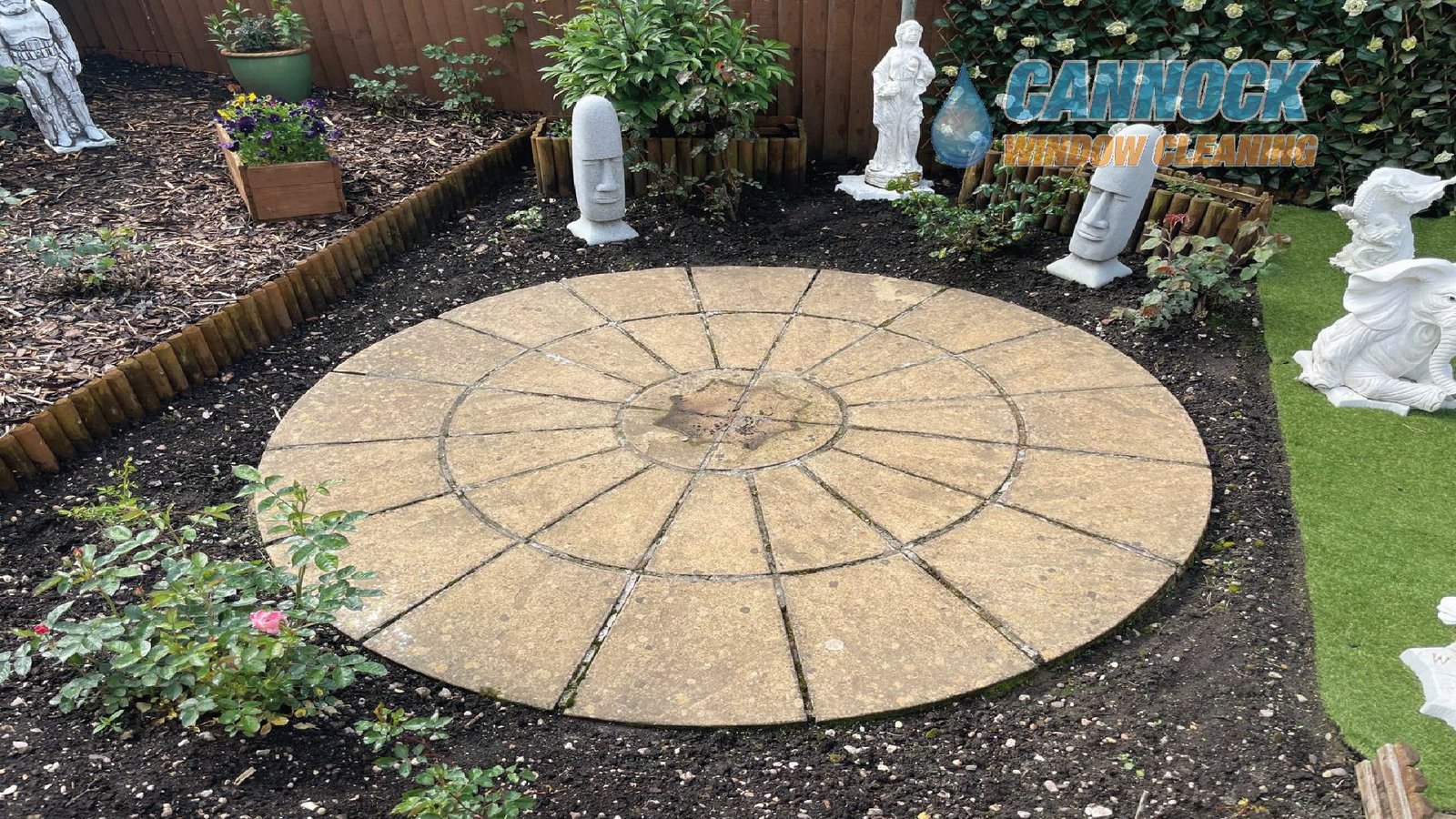Circular patio stained and dark before cleaning