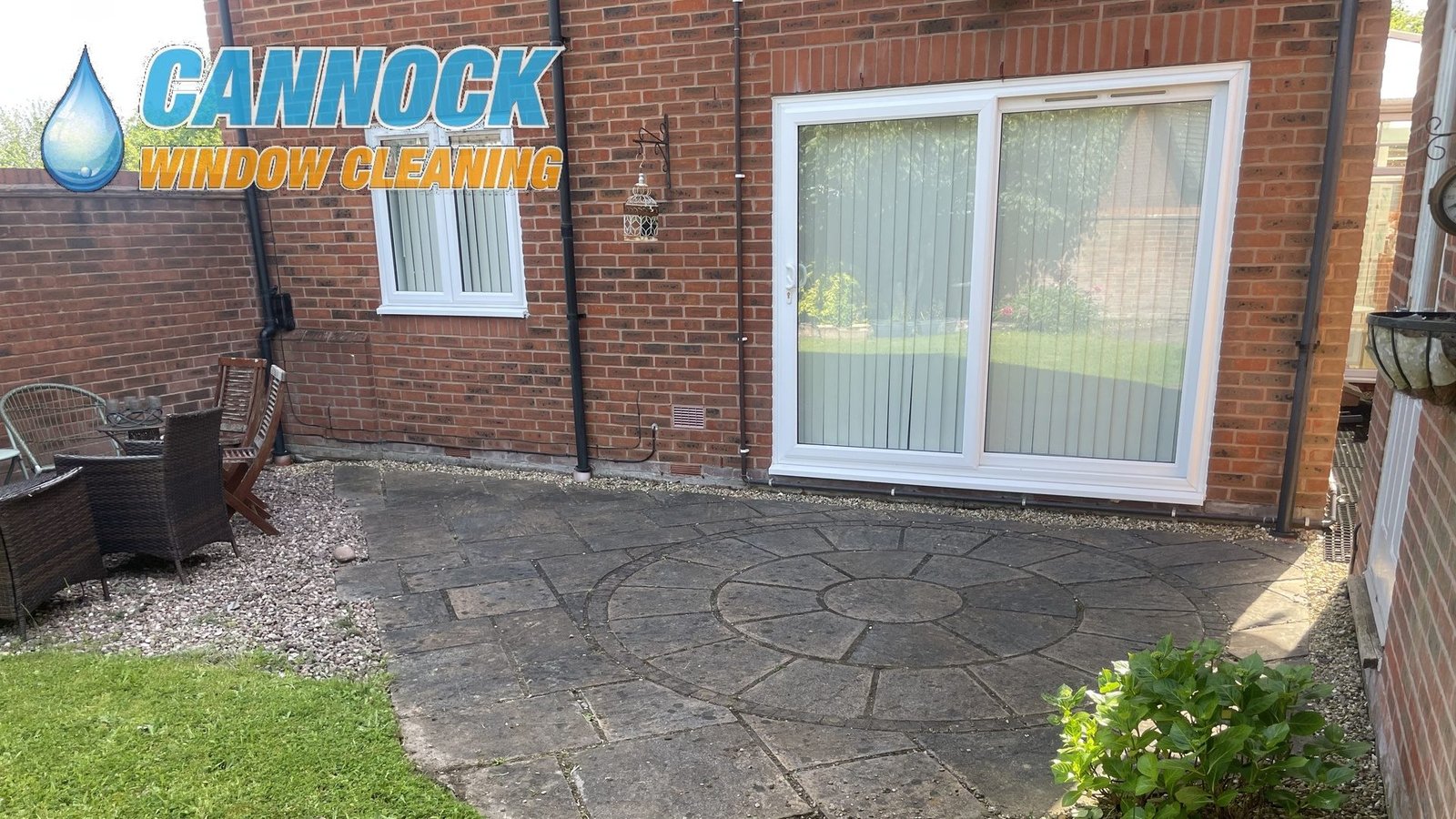 Circle patio by a back door dark and dirty before cleaning