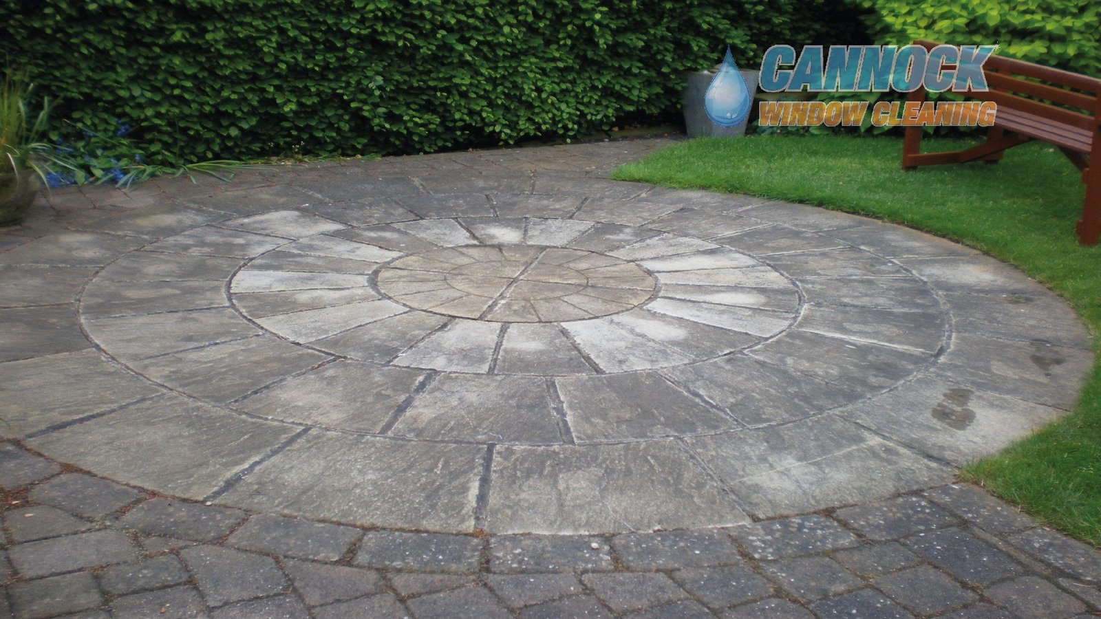 Circle patio faded and grey before cleaning