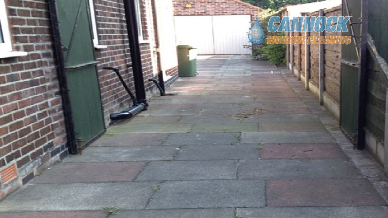 Coloured slab path dull and dirty before cleaning